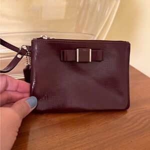 Coach Burgundy Wristlet with Bow Detail